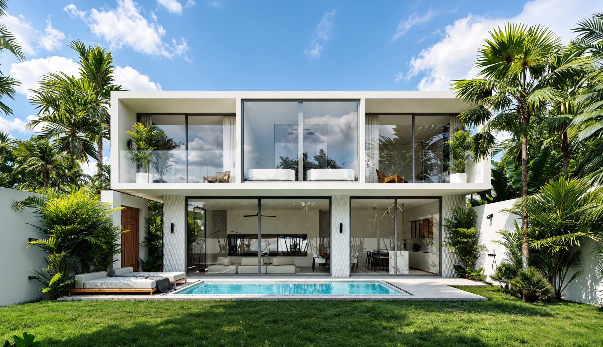 Two-storey Haven Villa with floor-to-ceiling glazing, a private pool and a lawn edged by palms